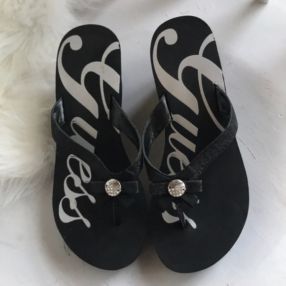 guess wedge flip flops
